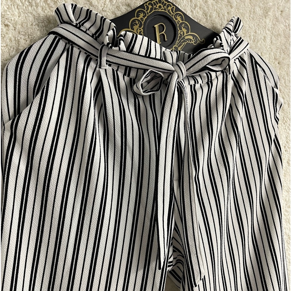 Almost Famous Dress black and white strip pants. So easy to wash and go. 🧶